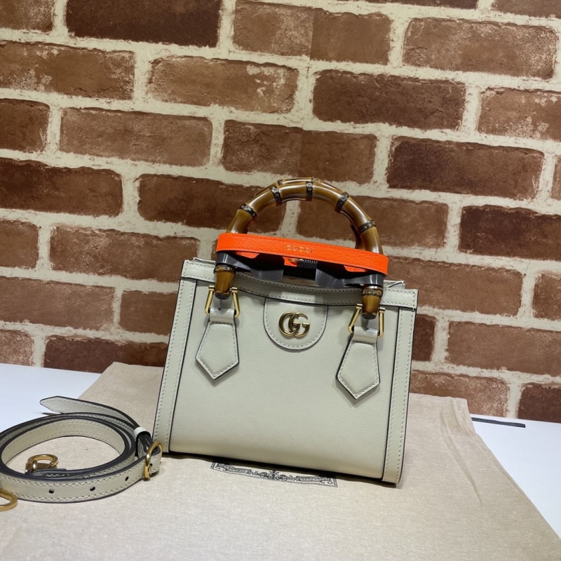 G*u*i top handle bags